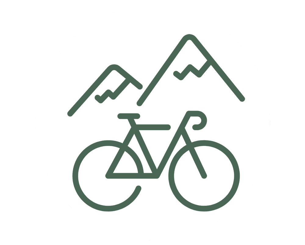 Simple bicycle icon with mountains in the background.